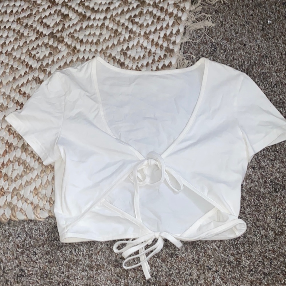 Cute white crop top with tied openings